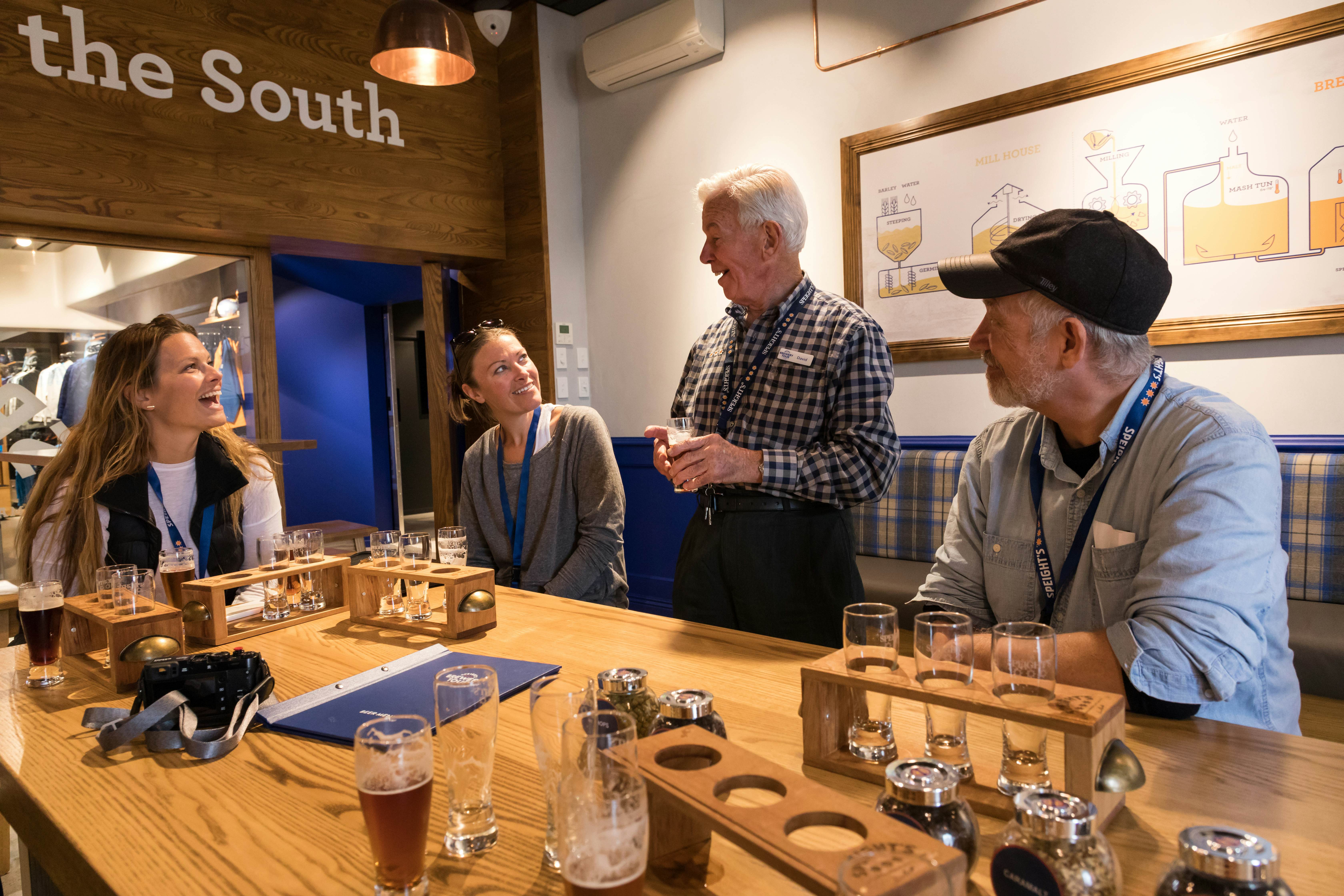 Dunedin, New Zealand. November 9 2017. Tourists enjoy beer tasting at the end or a tour of the historic Speight's Brewery, License Type: media, Download Time: 2025-03-20T20:27:05.000Z, User: mvm_lonelyplanet, Editorial: true, purchase_order: 56530 - Guidebooks, job: New Zealand 22, client: Global Publishing-WIP, other: Virginia Moreno