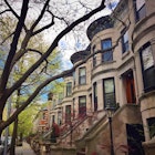 19th-century brownstones in Park Slope, Brooklyn during springtime on a sunny day
