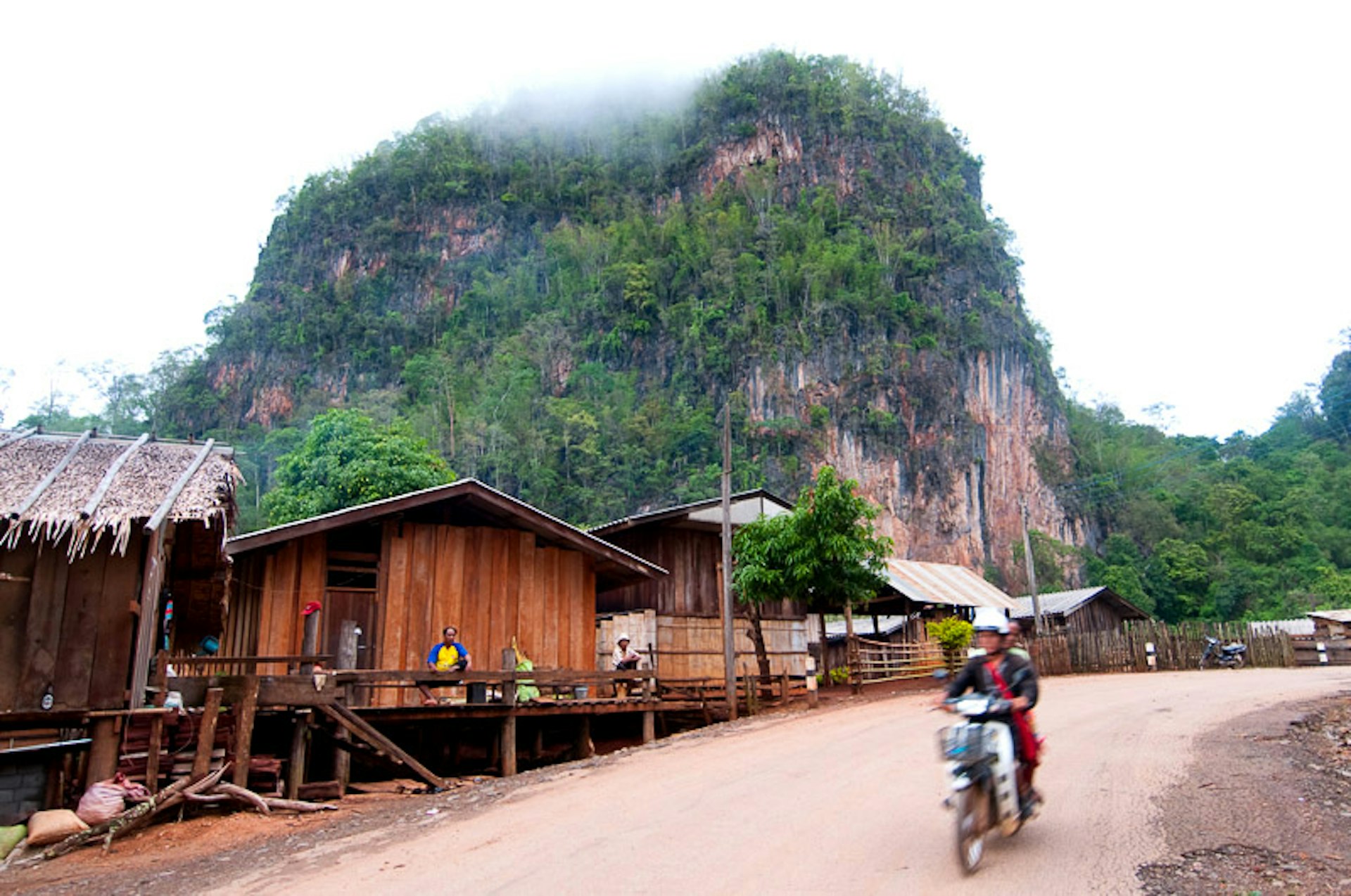 Driving past a Lahu village in Mae Hong Son, northern Thailand. Image by Lonely Planet