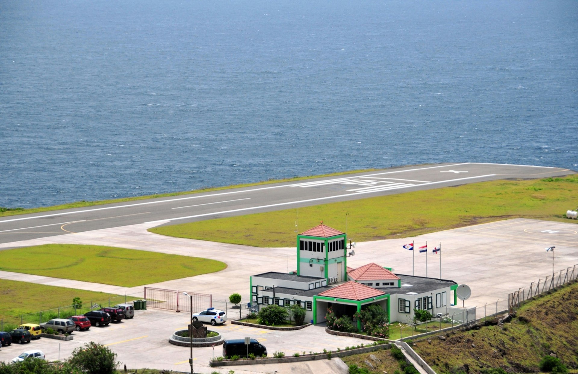 View of the Juancho E. Yrausquin Airport, including the terminal building and control tower. The runway, located on the Caribbean island of Saba, is the shortest in the world.  