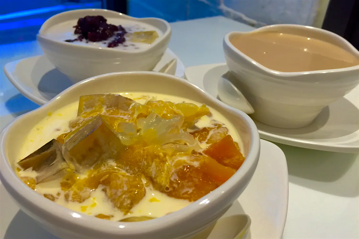 Features - Sweet soup: mango pomelo sago, cashew, tofu pudding with red bean paste. Image by Piera Chen / Lonely Planet Sweet soup: mango pomelo sago, cashew, tofu pudding with red bean paste. Image by Piera Chen / Lonely Planet