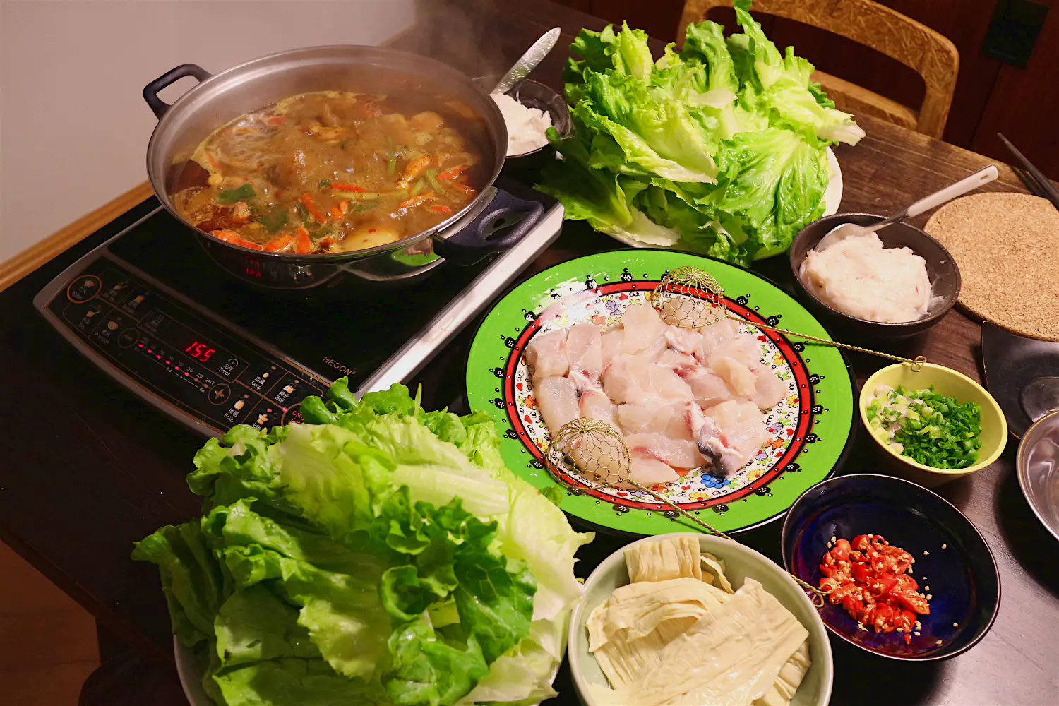 Features - Spicy hotpot with all the condiments. Image by Piera Chen / Lonely Planet Spicy hotpot with all the condiments. Image by Piera Chen / Lonely Planet