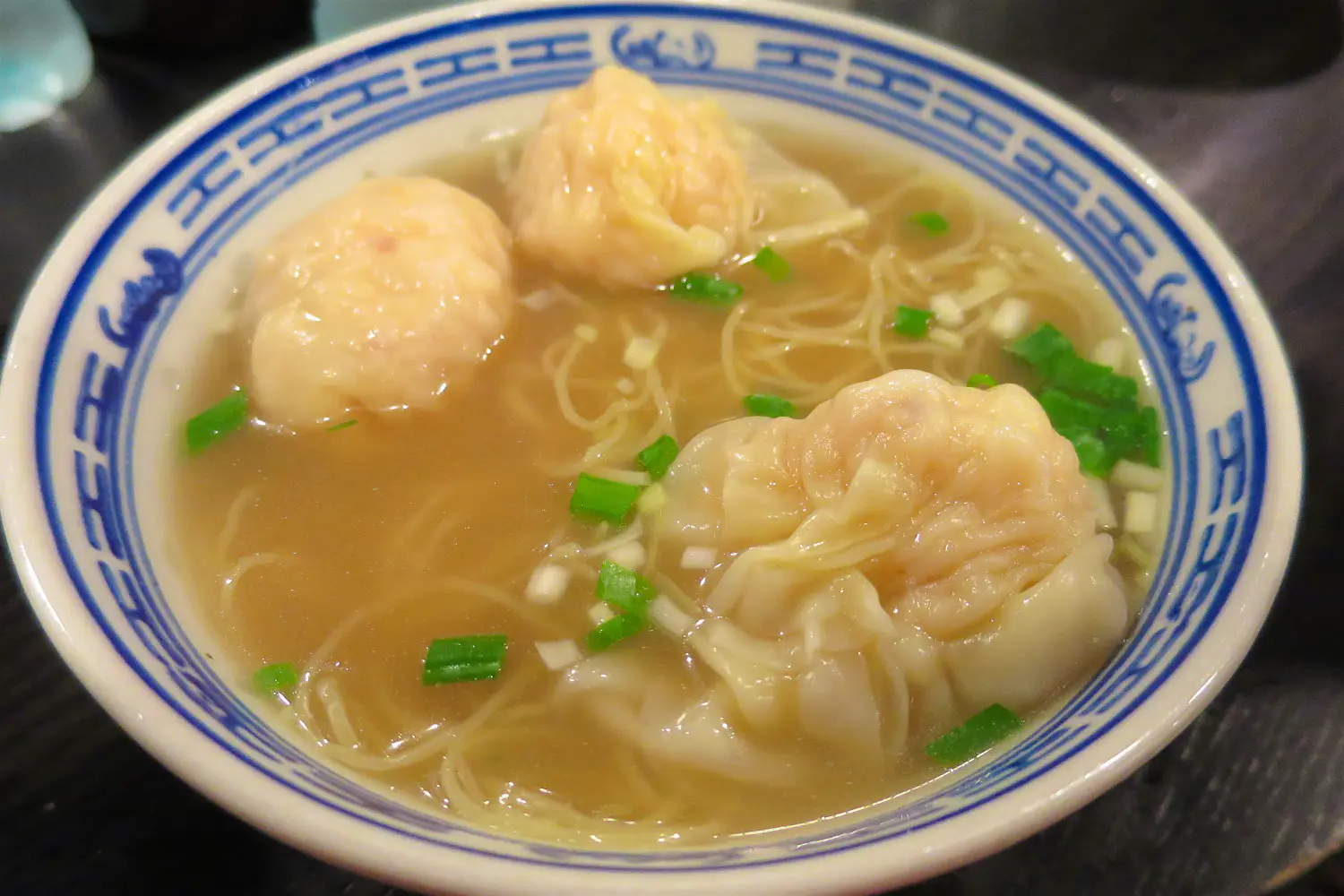 Features - Clouds in a scroll painting: perfect wonton noodles. Image by Megan Eaves / Lonely Planet Clouds in a scroll painting: perfect wonton noodles. Image by Megan Eaves / Lonely Planet