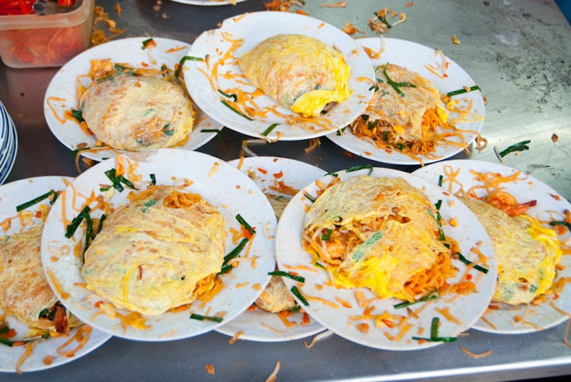 Dishes of pat Thai at Thip Samai, Bangkok. Image by Austin Bush