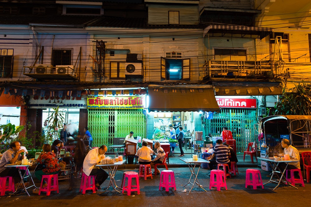Dining streetside in Bangkok’s Chinatown. Image by Austin Bush