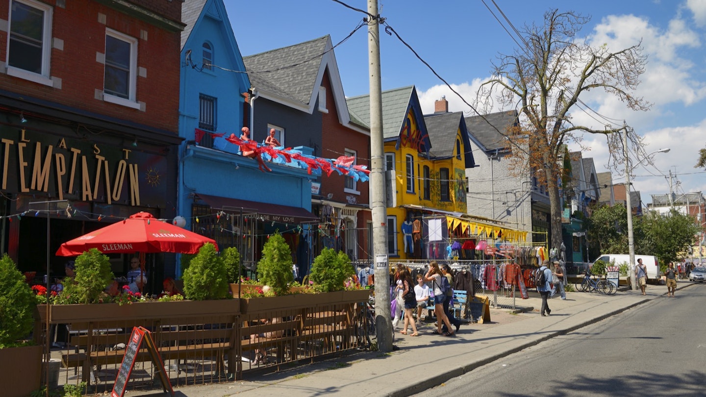 Colorful shops and buildings on Kensington Avenue Market in Toronto