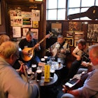 Musicians gather for a session in O'Donoghues, Dublin © Tim Clayton / Corbis via Getty Image