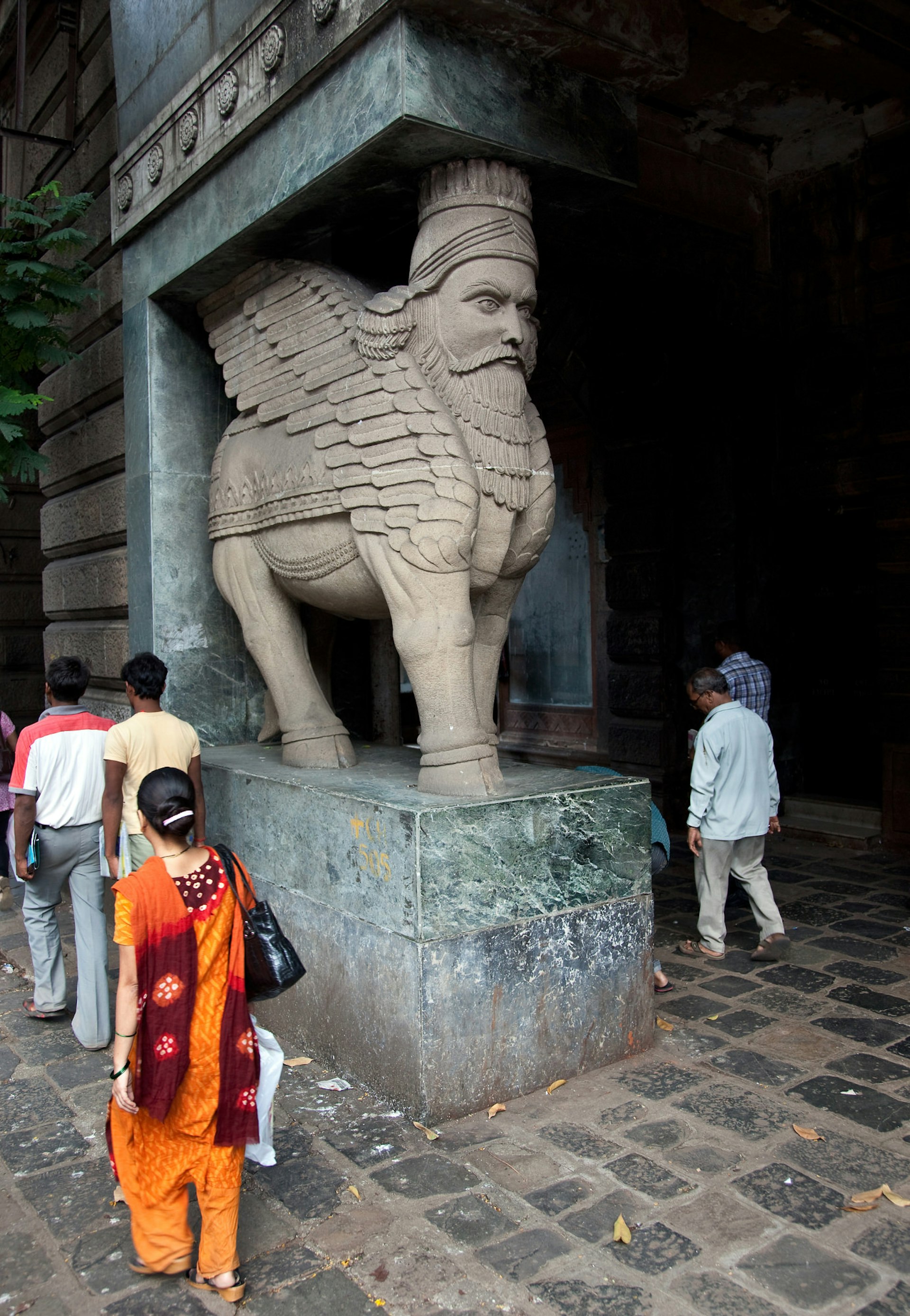 A statue of a winged bull with a human face adorns a Parsi building in the old town © Graham Crouch / Getty Images