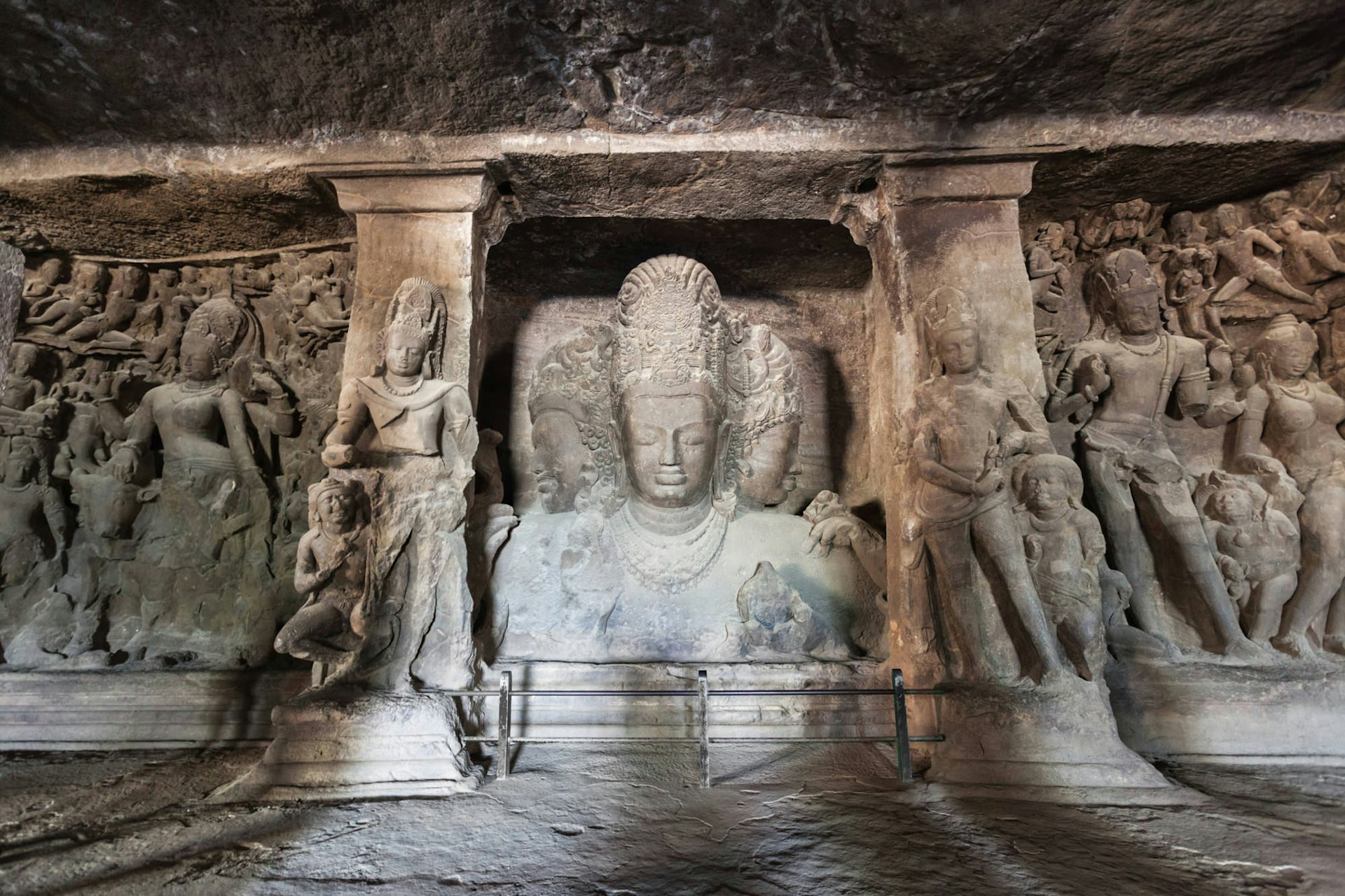 Dramatic carvings of Hindu deities inside the Elephanta Caves © saiko3p / Getty Images