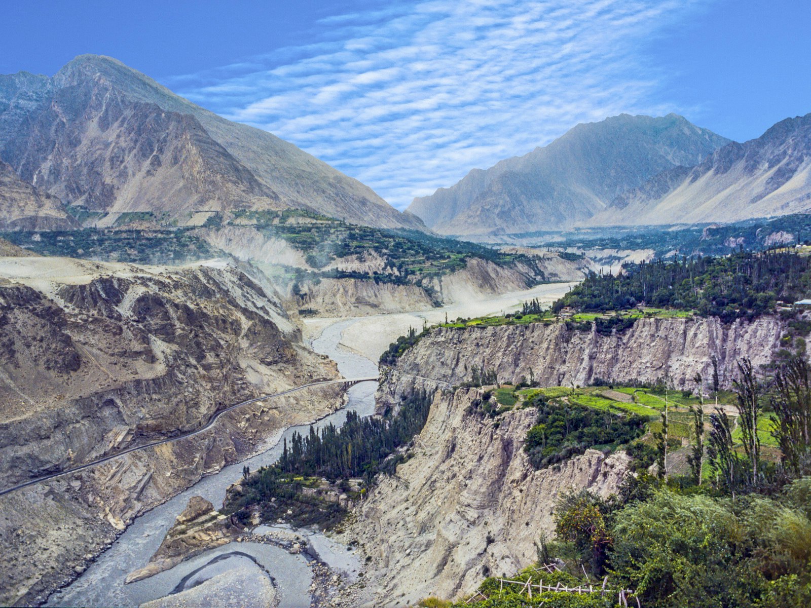 A section of the Karakoram Highway running through a valley in Karimabad in Pakistan © travelview /Shutterstock