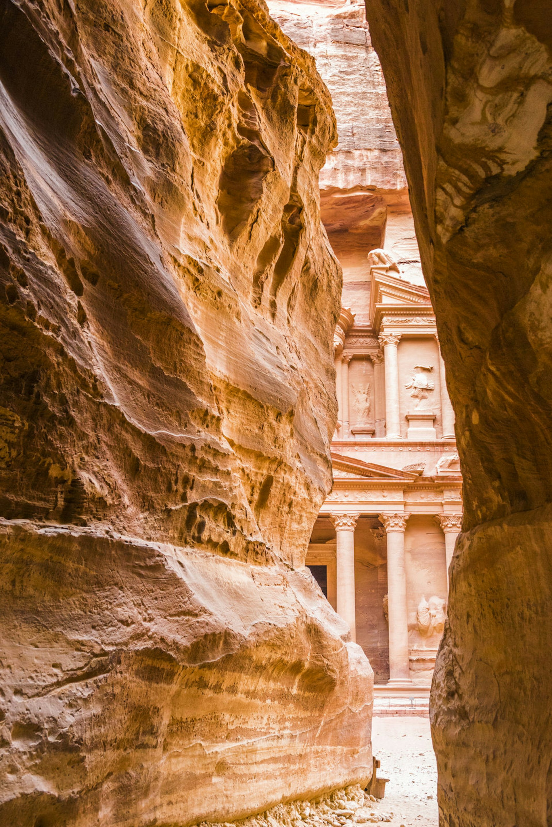 A first glimpse of the Treasury from the Siq, a natural fissure in the sandstone rocks of Petra ©Tom Mackie / Lonely Planet 