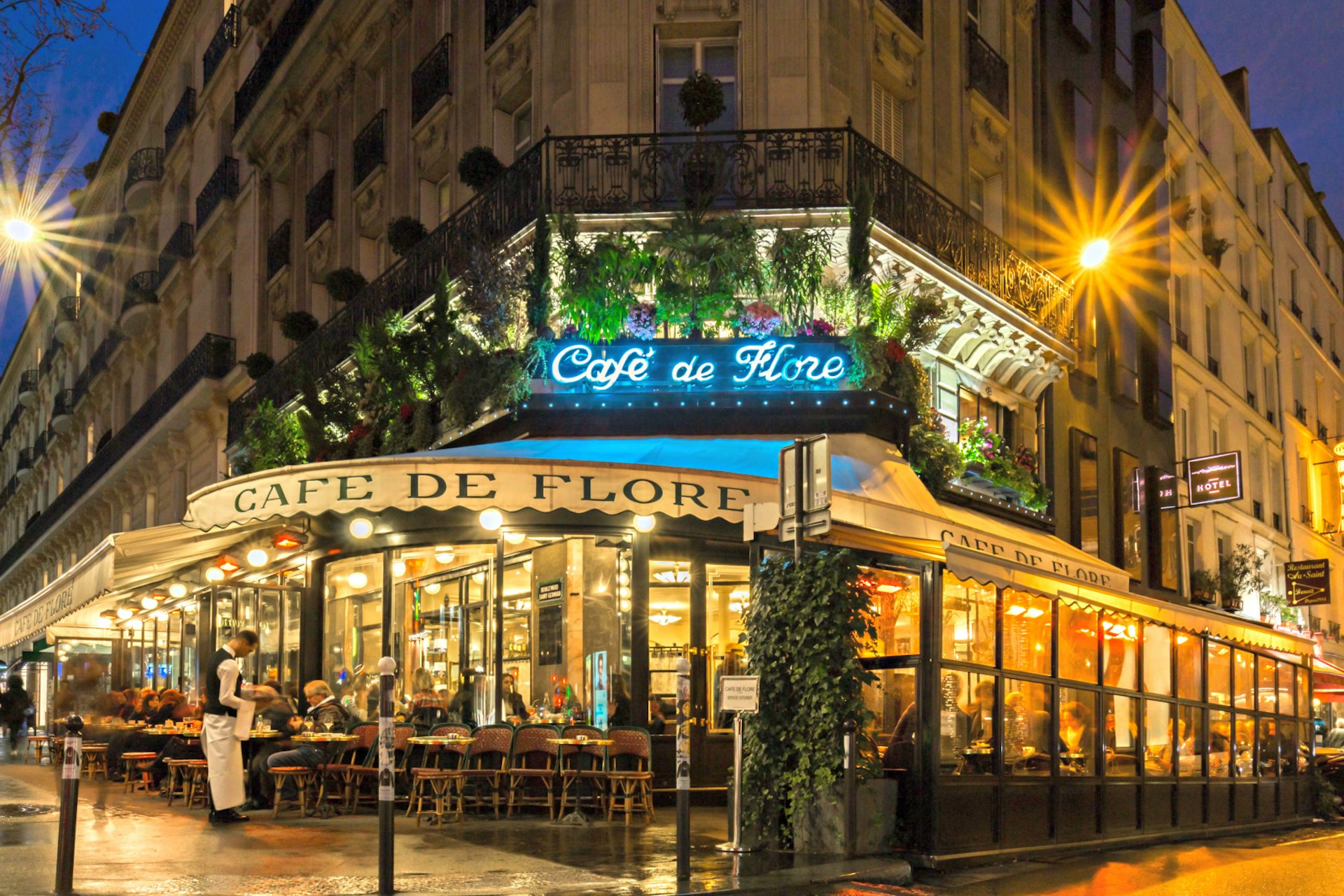 Café de Flore in Paris lit up at night