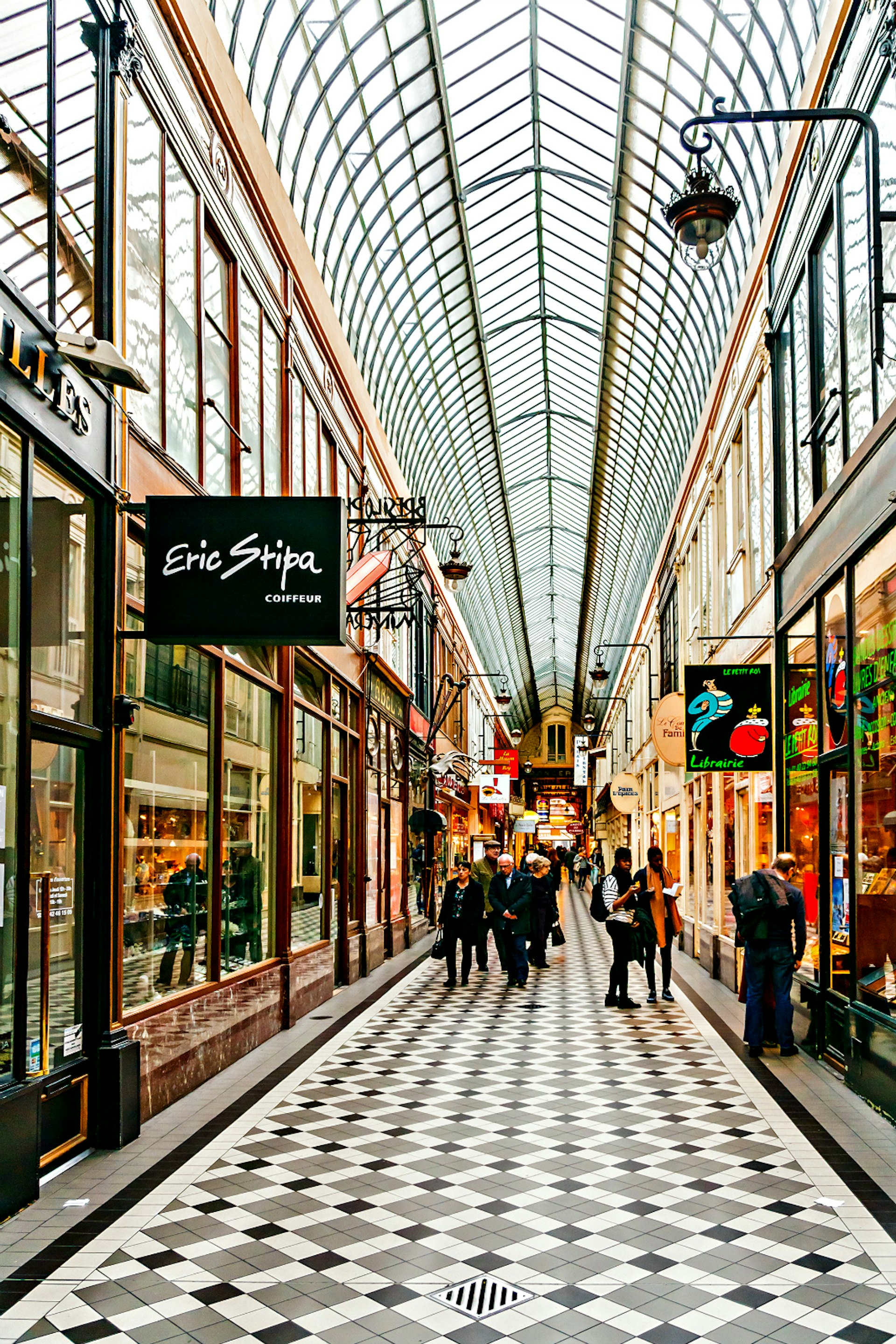 Jouffroy Passage in Paris - one of most charming covered arcades with a lot of jewelers shops, confectionery, boutiques and shops