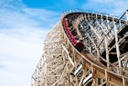 Features - Classic roller coaster with people at Cedar Point, Sandusky, Ohio