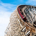 Features - Classic roller coaster with people at Cedar Point, Sandusky, Ohio