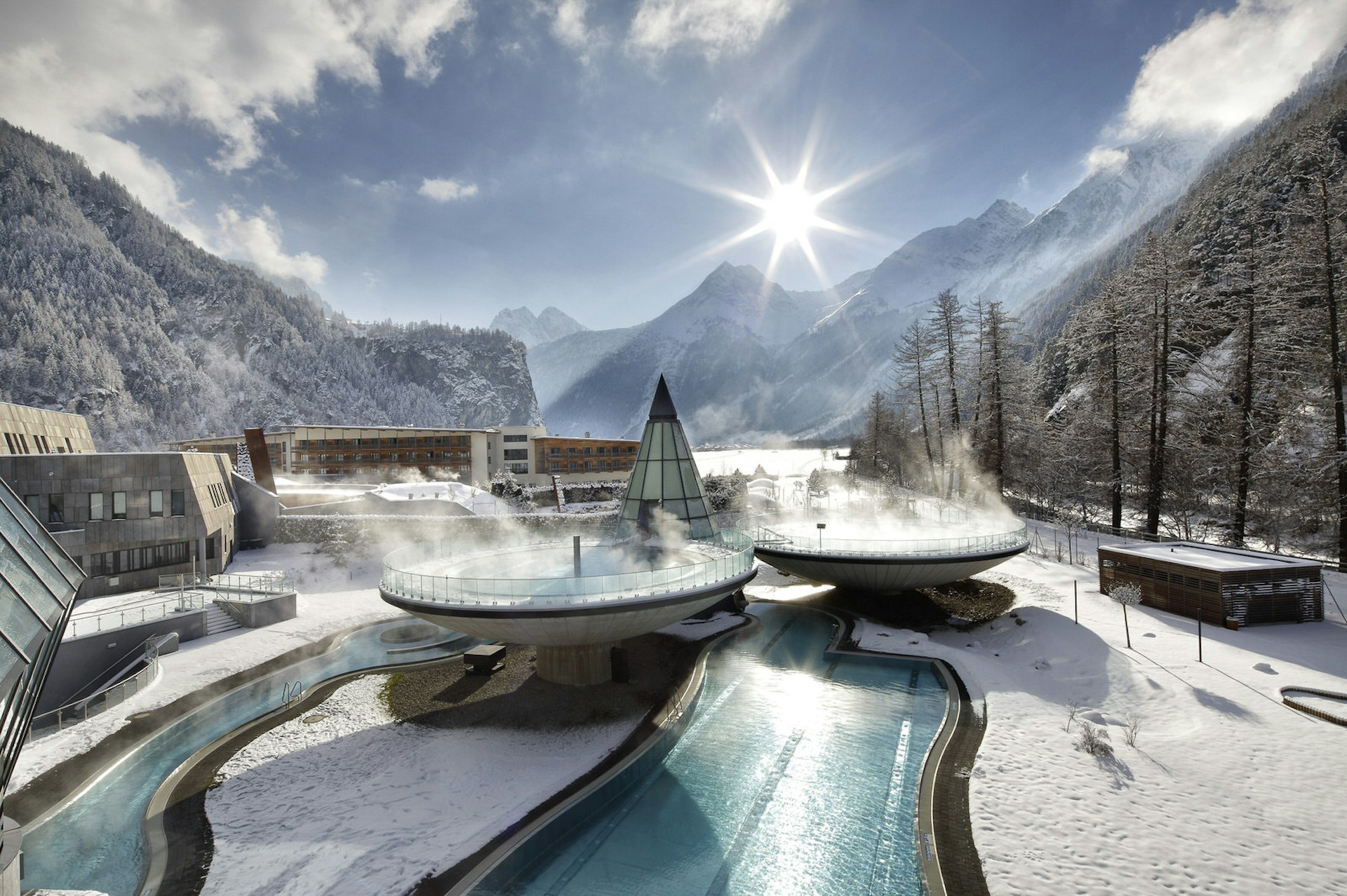 The Aqua Dome complex with its 'levitating' outdoor pools shrouded in snow