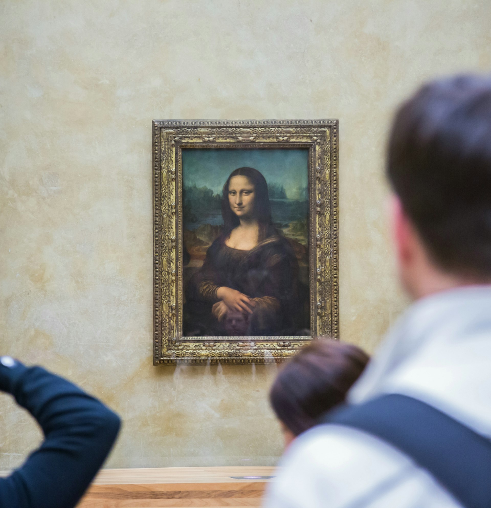 Mona Lisa by Leonardo da Vinci hangs in the Louvre