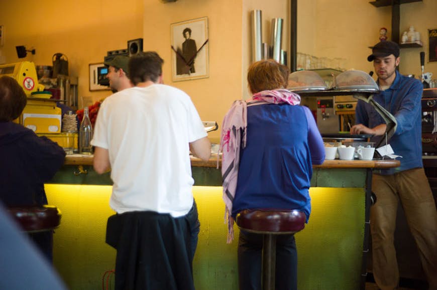 Man and woman at the counter, Café Gitane. Image by Ricky Montalvo / CC BY ND 2.0