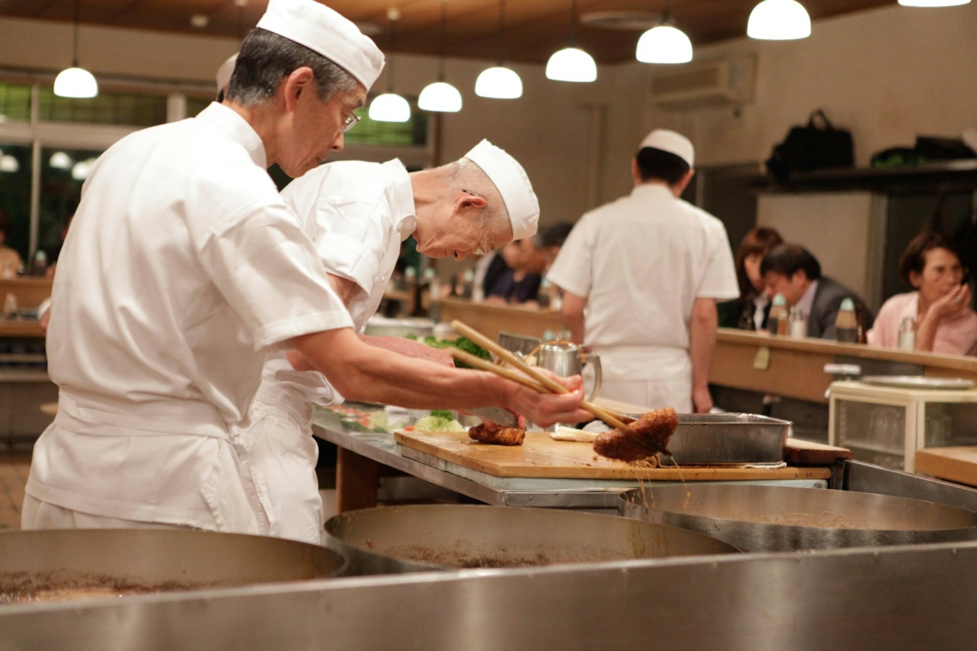 Chefs at work at Tonki, Tokyo