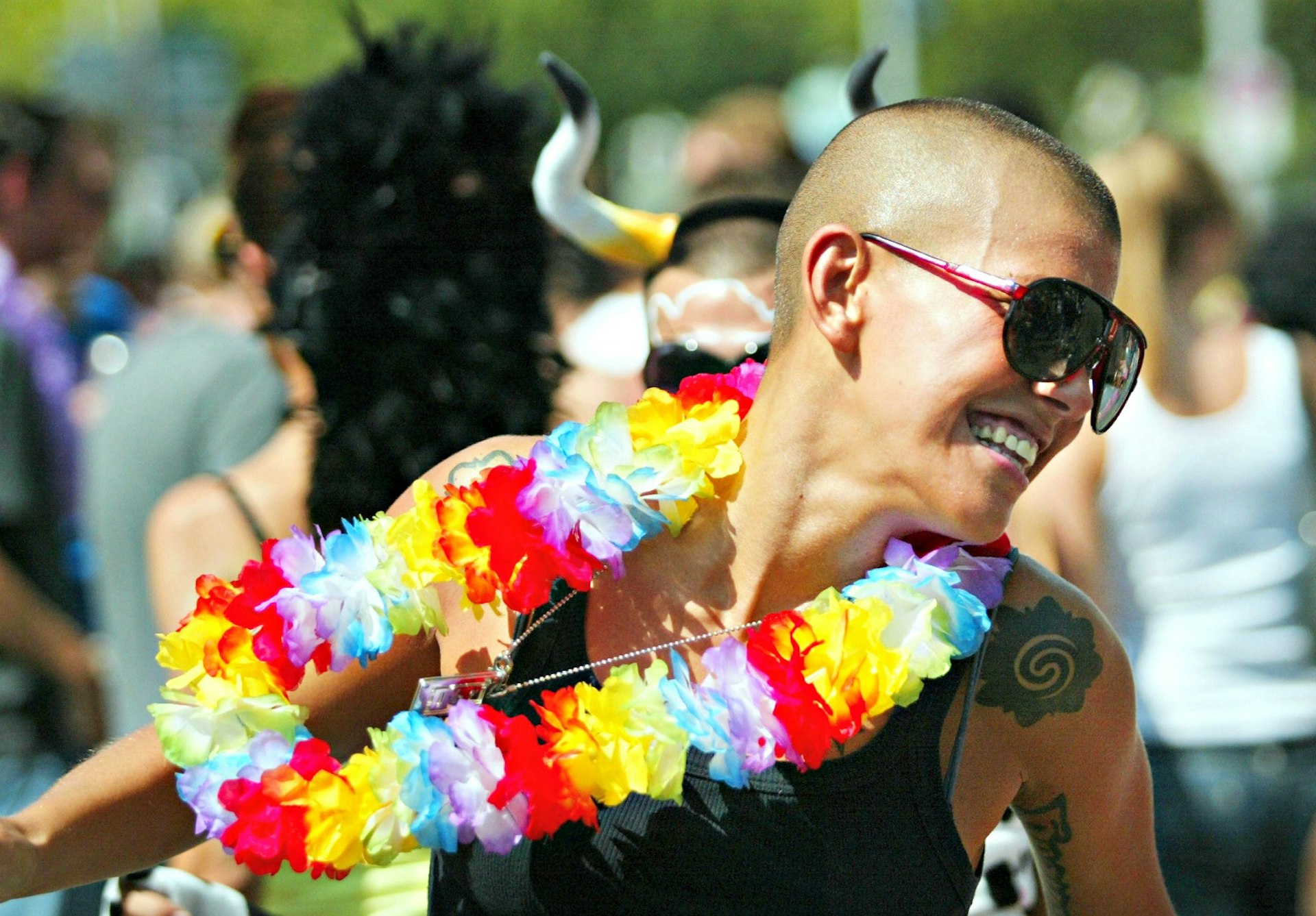 A techno fan dancing during the 17th annual techno street parade in Zurich