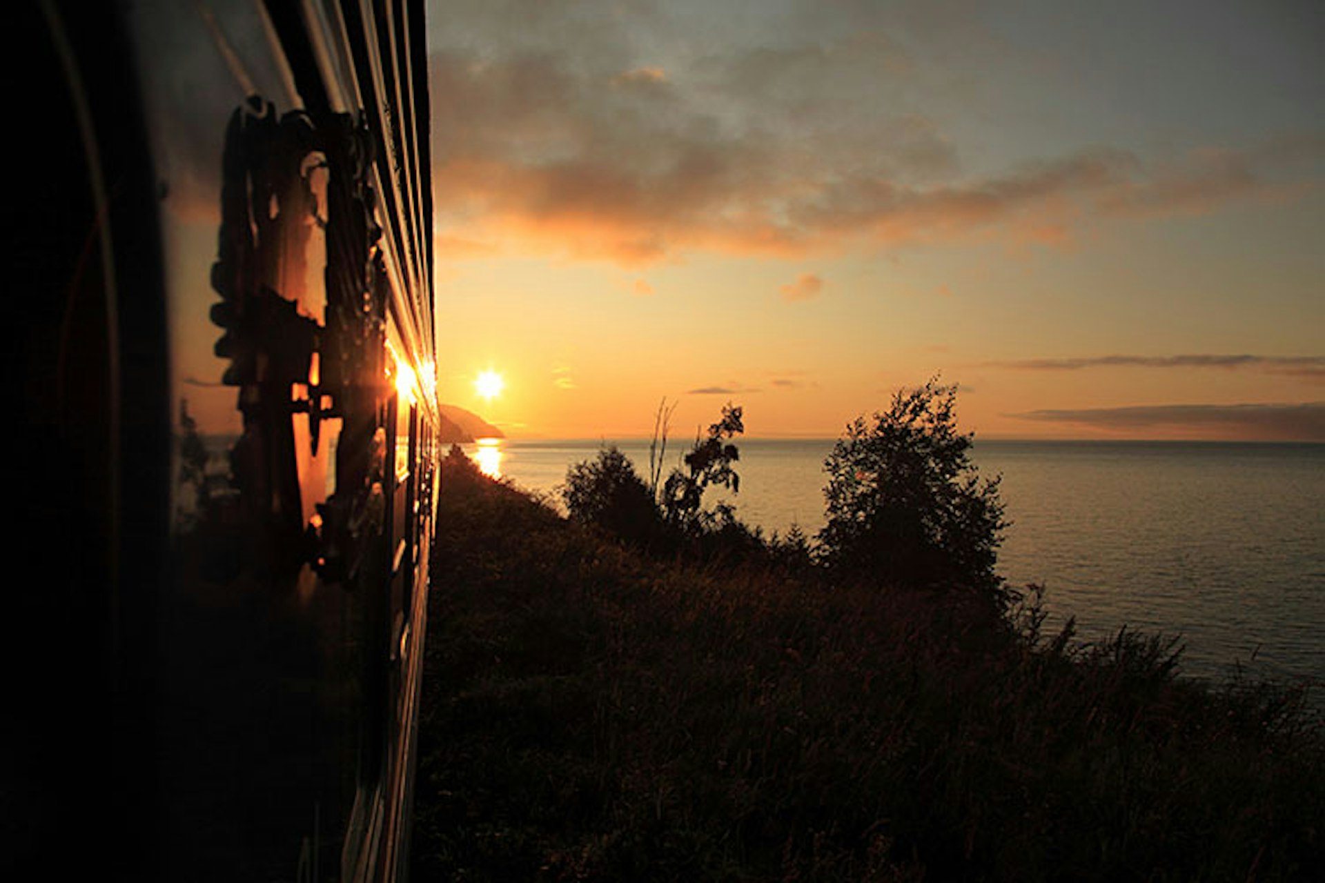 Lake Baikal at sunset seen from the railway line © Image Source / Getty Images