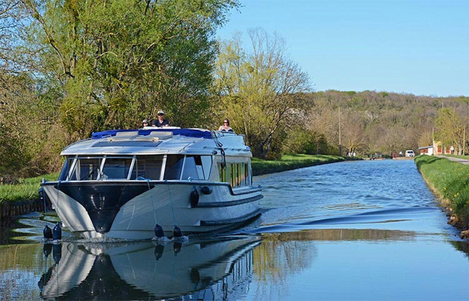 See a slower-paced France aboard a boat, like this cruiser on the Canal du Nivernais. Image by Patrick Kinsella / Lonely Planet