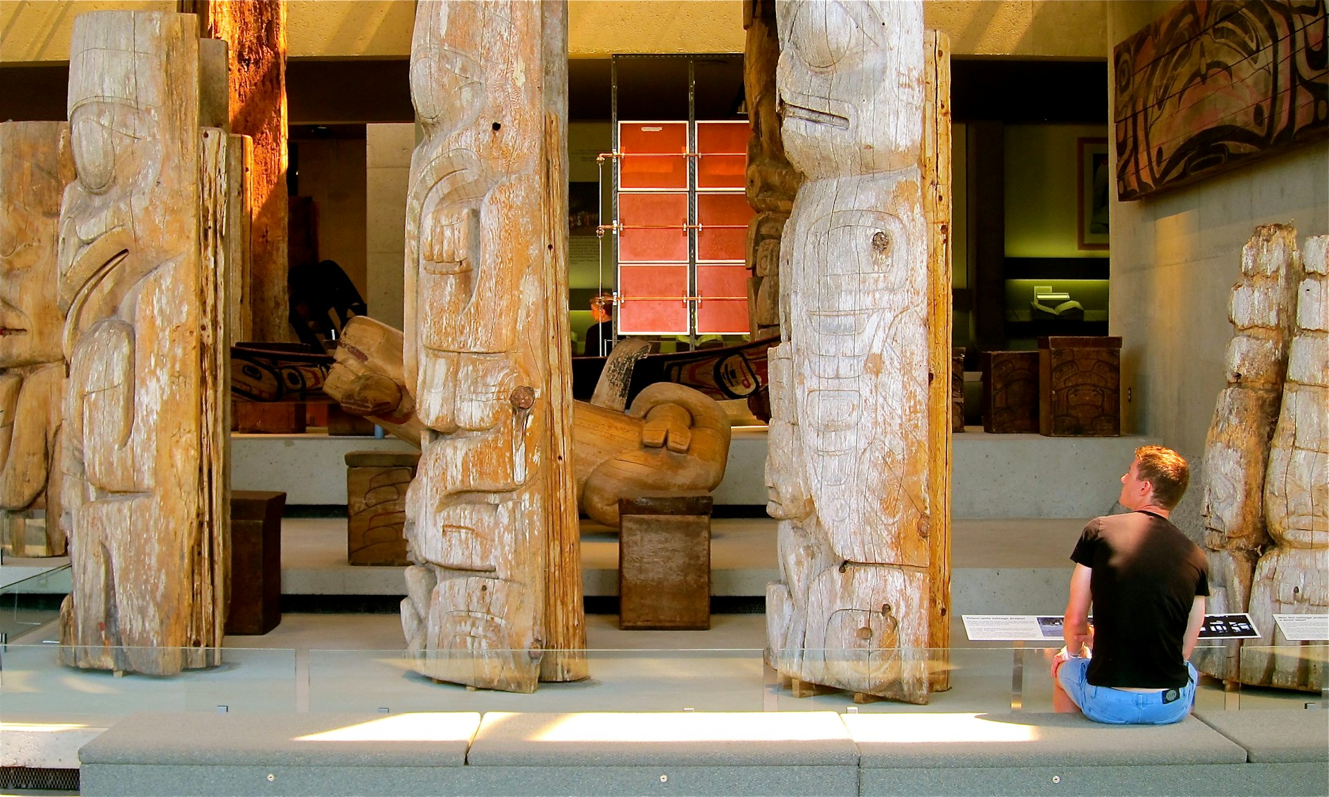 Studying the ancient totem poles at the Museum of Anthropology © John Lee / Lonely Planet