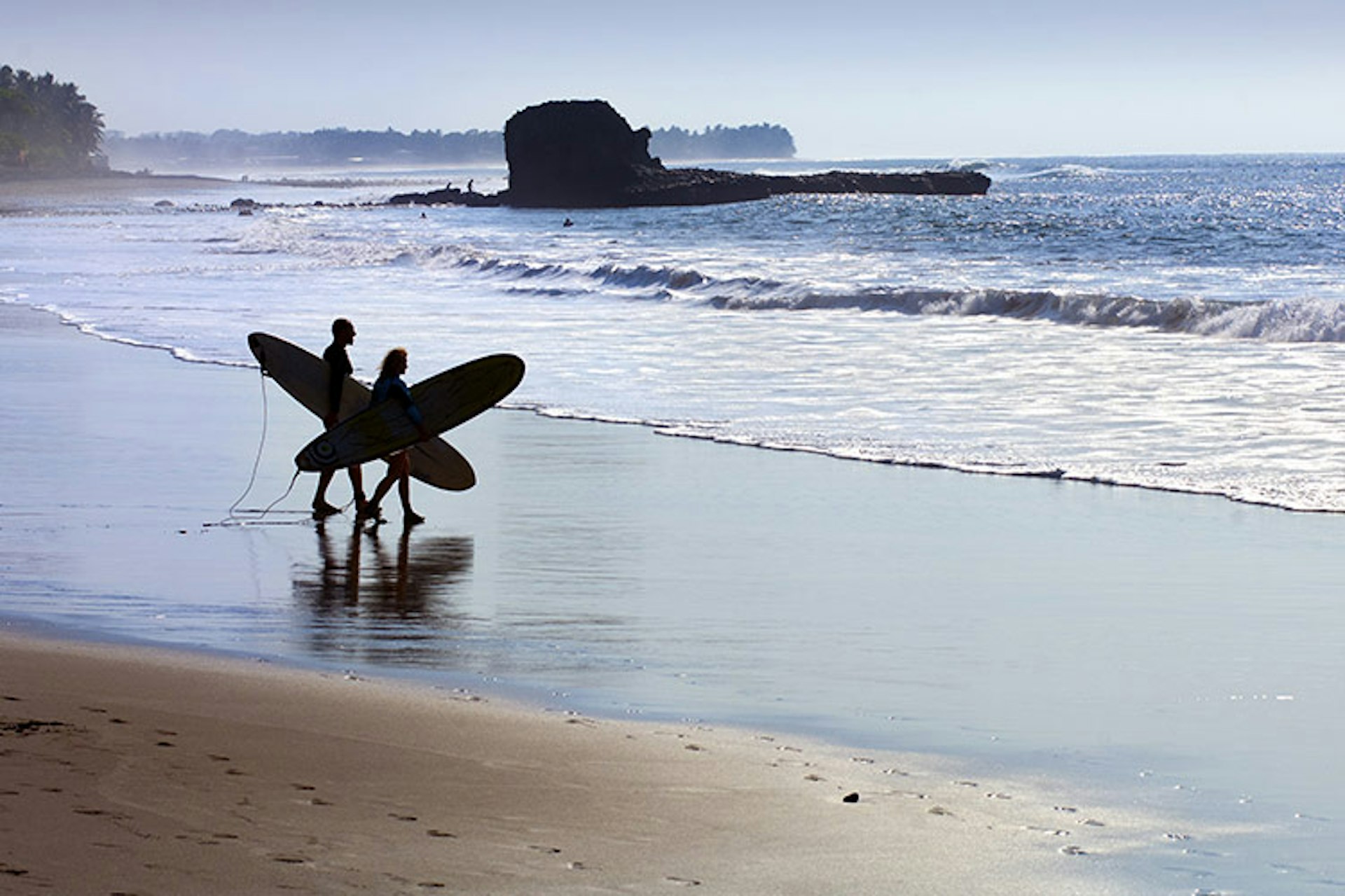 Surf's up at El Tunco, El Salvador, so do the deed and hit the beach. Image by John Coletti / AWL Images / Getty Images.