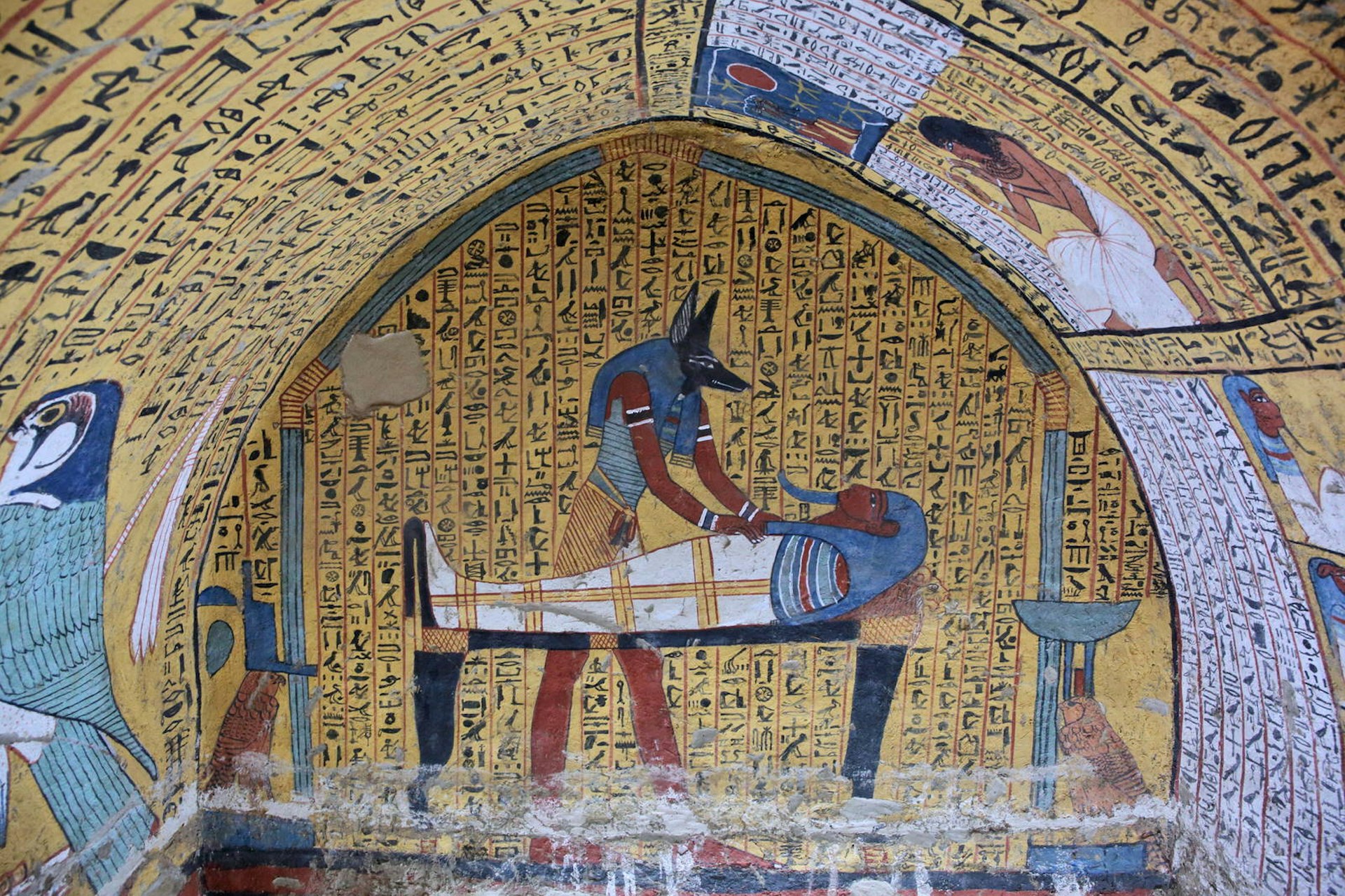 Wall painting and decoration of the tomb: ancient Egyptian gods and hieroglyphs in wall painting. Image by Vladimir Melnik / Shutterstock