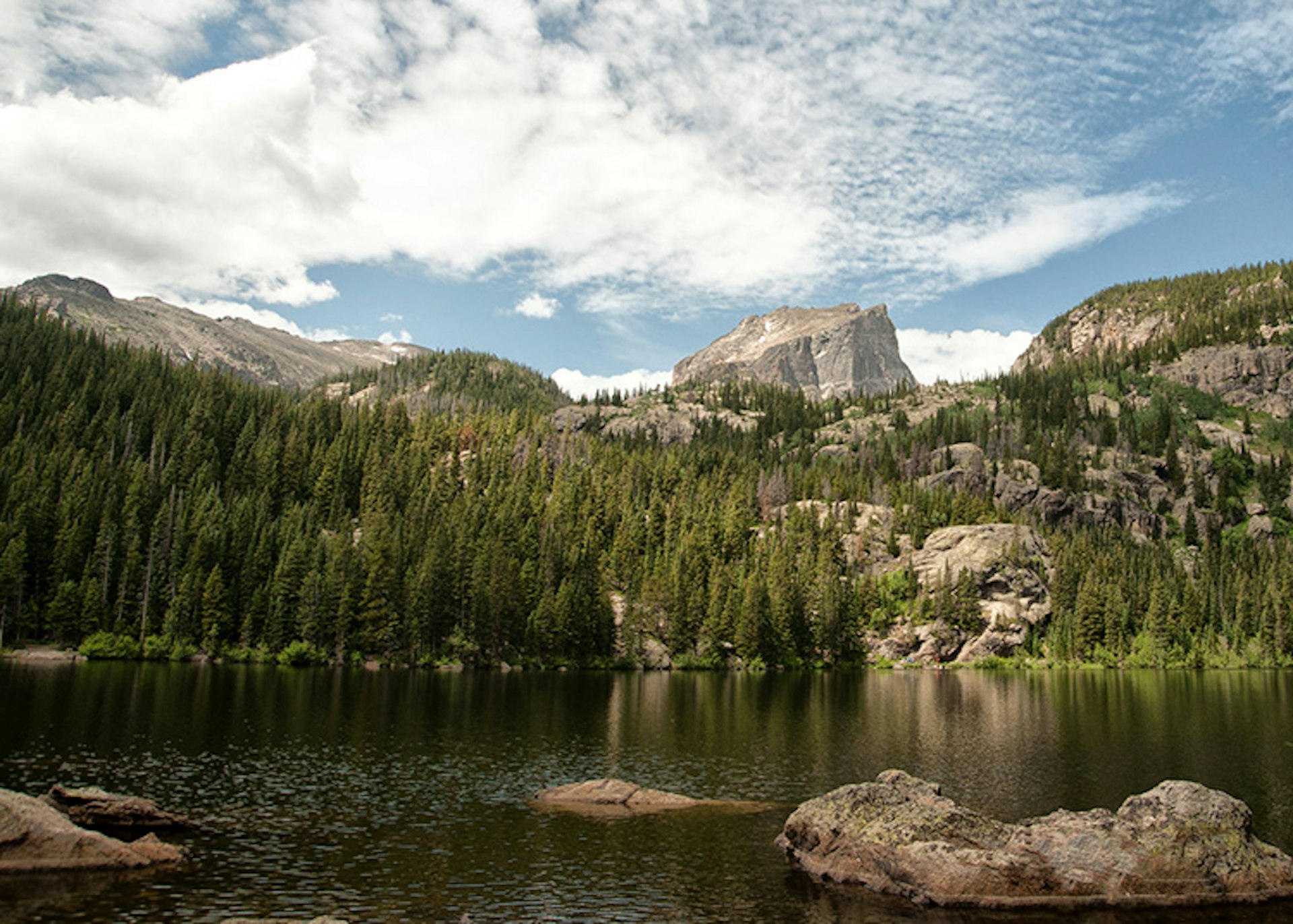 The serenity of Bear Lake affords spectacular views of nearby peaks. Image by txbowen / CC BY 2.0