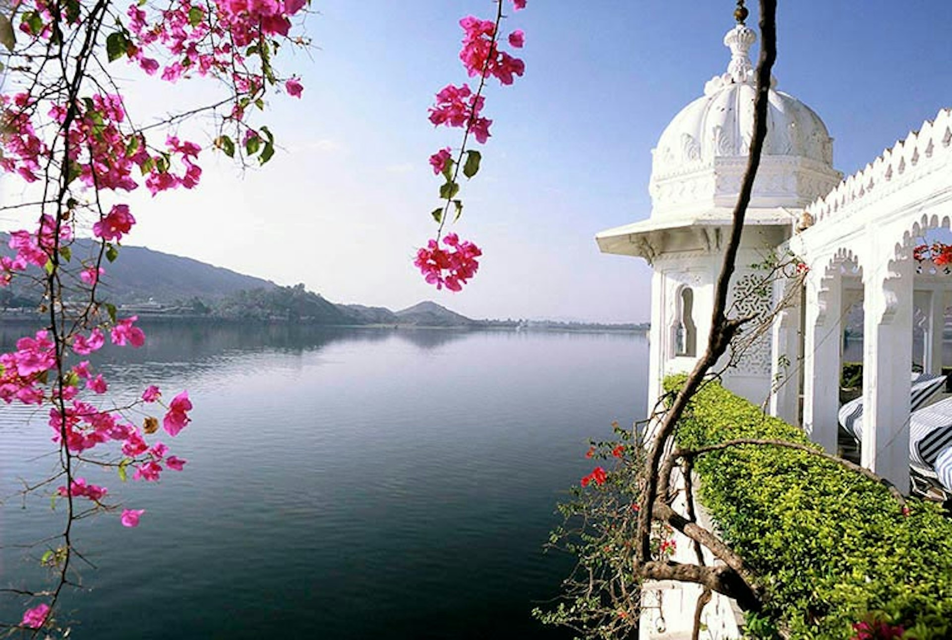 A hotel on its very own island - enjoy the grandeur and seclusion of the Lake Palace Hotel to woo your would-be spouse. Image by Chris Caldicott / Axiom Photographic Agency / Getty Images