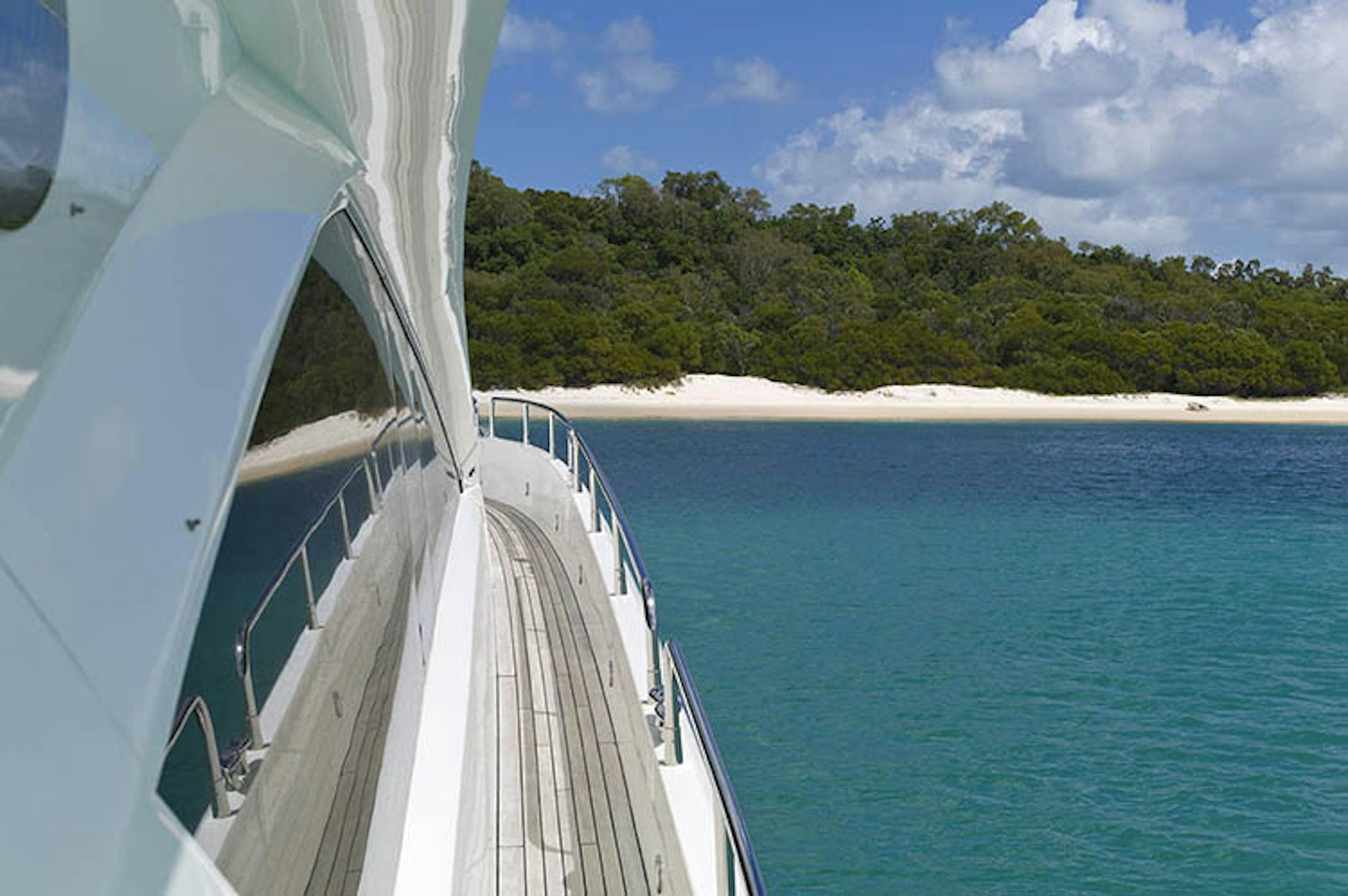 Sailing towards Whitehaven Beach in Australia's Whitsunday Islands. Image by Wayne Fogden / Photolibrary / Getty Images