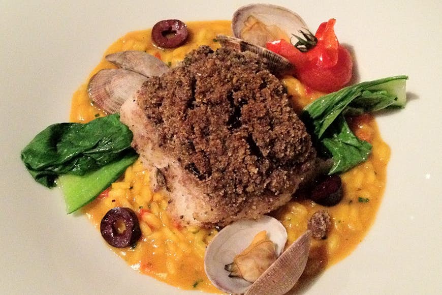 Olive-crusted hake at Simply Fosh in Palma. Image by MollySVH / CC BY 2.0