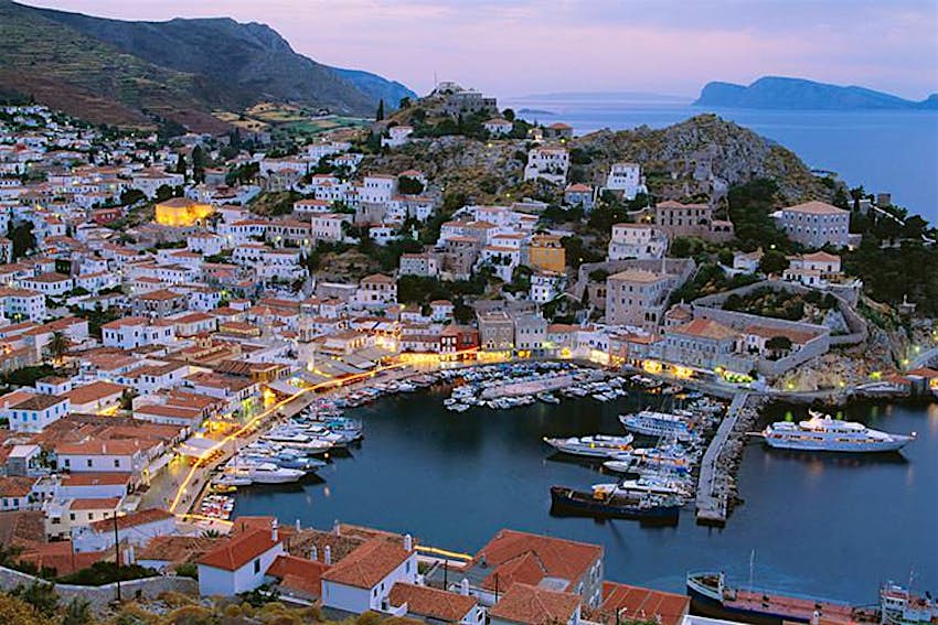 Features - hydra_cs The harbor of Hydra at dusk. Image by Shaun Egan / Photodisc / Getty Images