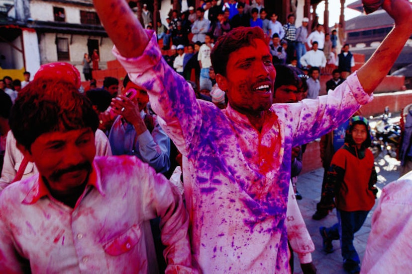 Revellers covered in coloured powder for Holi, Kathmandu. Richard I'Anson / Getty Images.