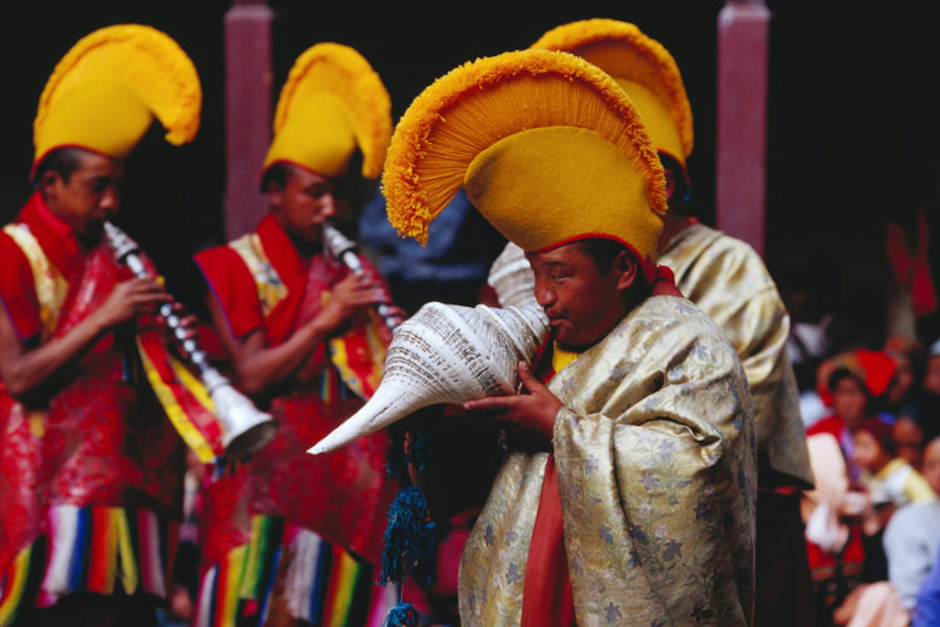 Monks sounding conch shells at Mani Rimdu festival. Image by Richard I'Anson / Getty Images.