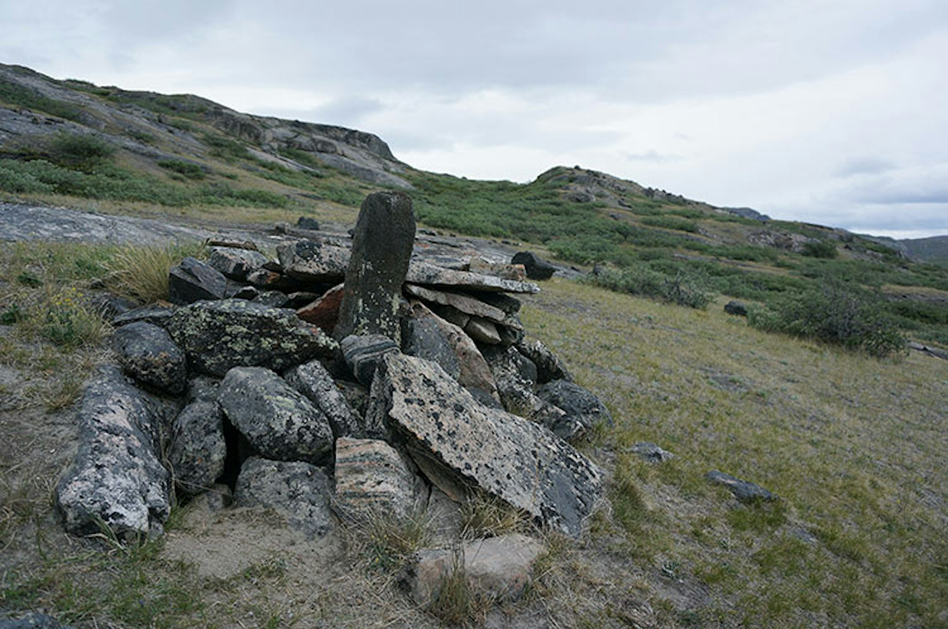 An Inuit grave: sites like this are easy to miss in the rocky expanse of western Greenland. Image by Anita Isalska / Lonely Planet
