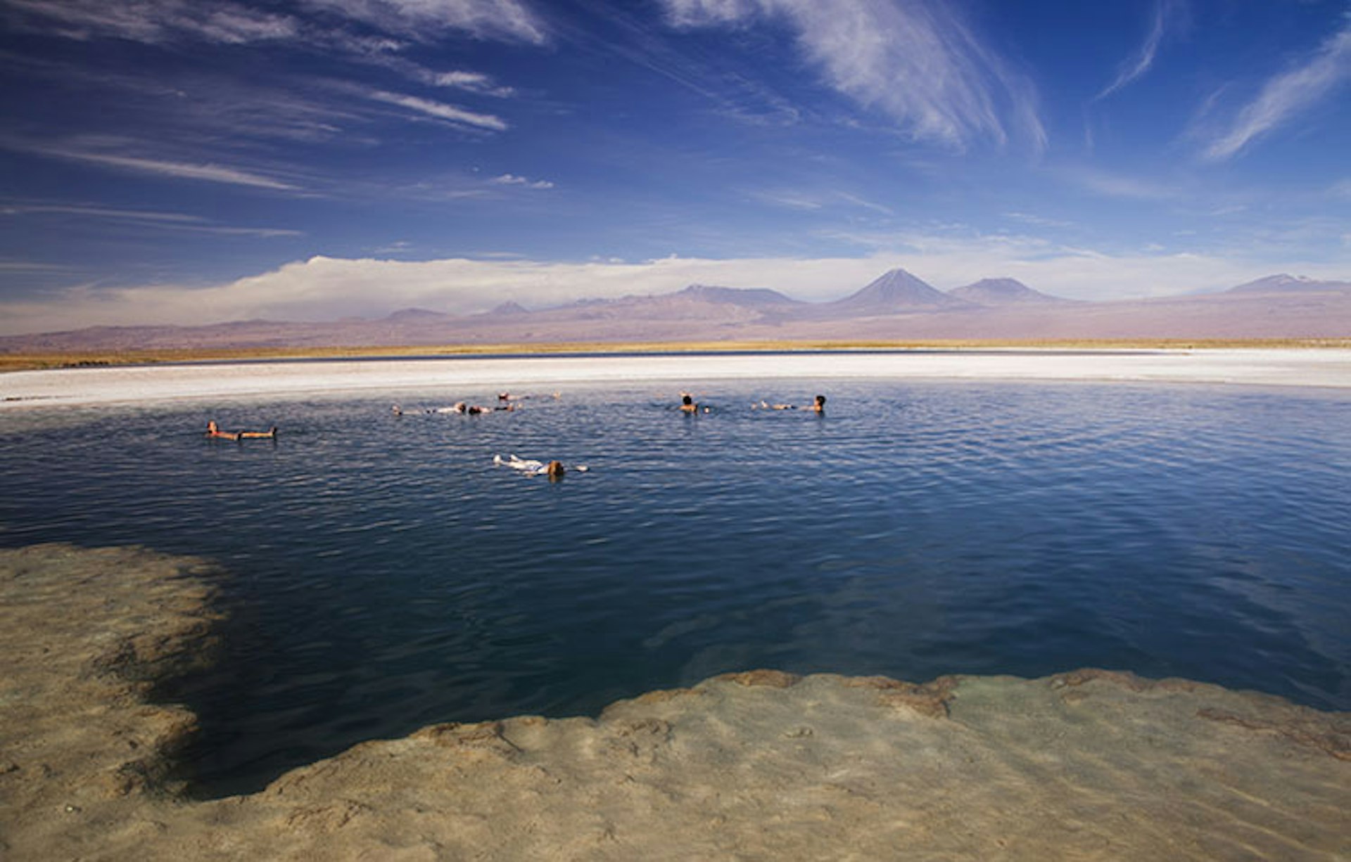 Salt water lagoon in the Atacama Desert, Salar De Atacama, San Pedro De Atacama, Antofagasta Region, Chile. Image by Kristin Piljay / Photostock / Getty