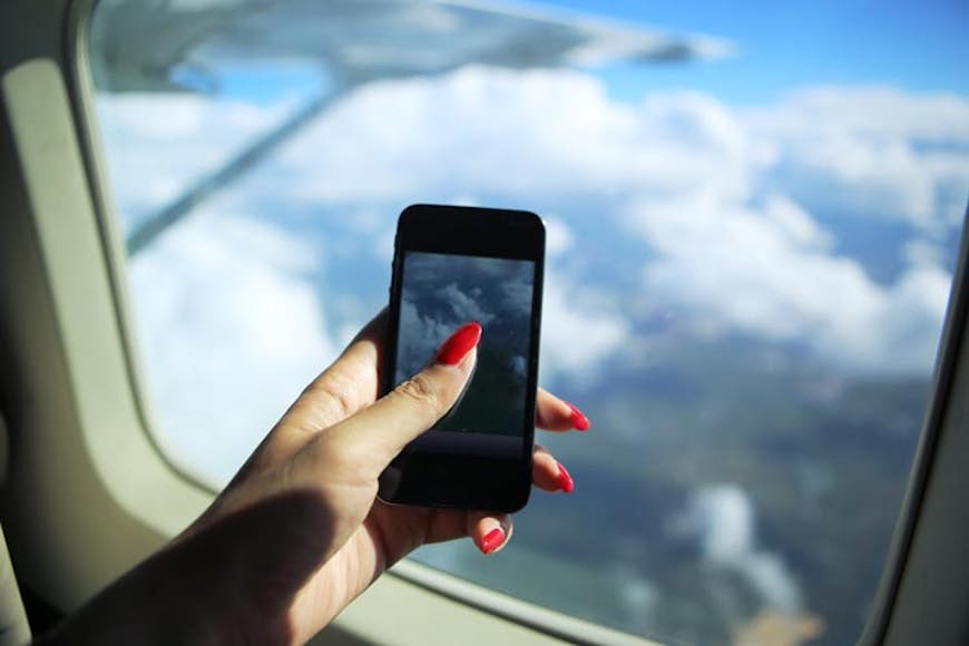 Att ta en Instagram-bild i luften är oemotståndlig när du har reseplanering och social delning till hands.  Bild av fotografi av Bobi / Getty Images