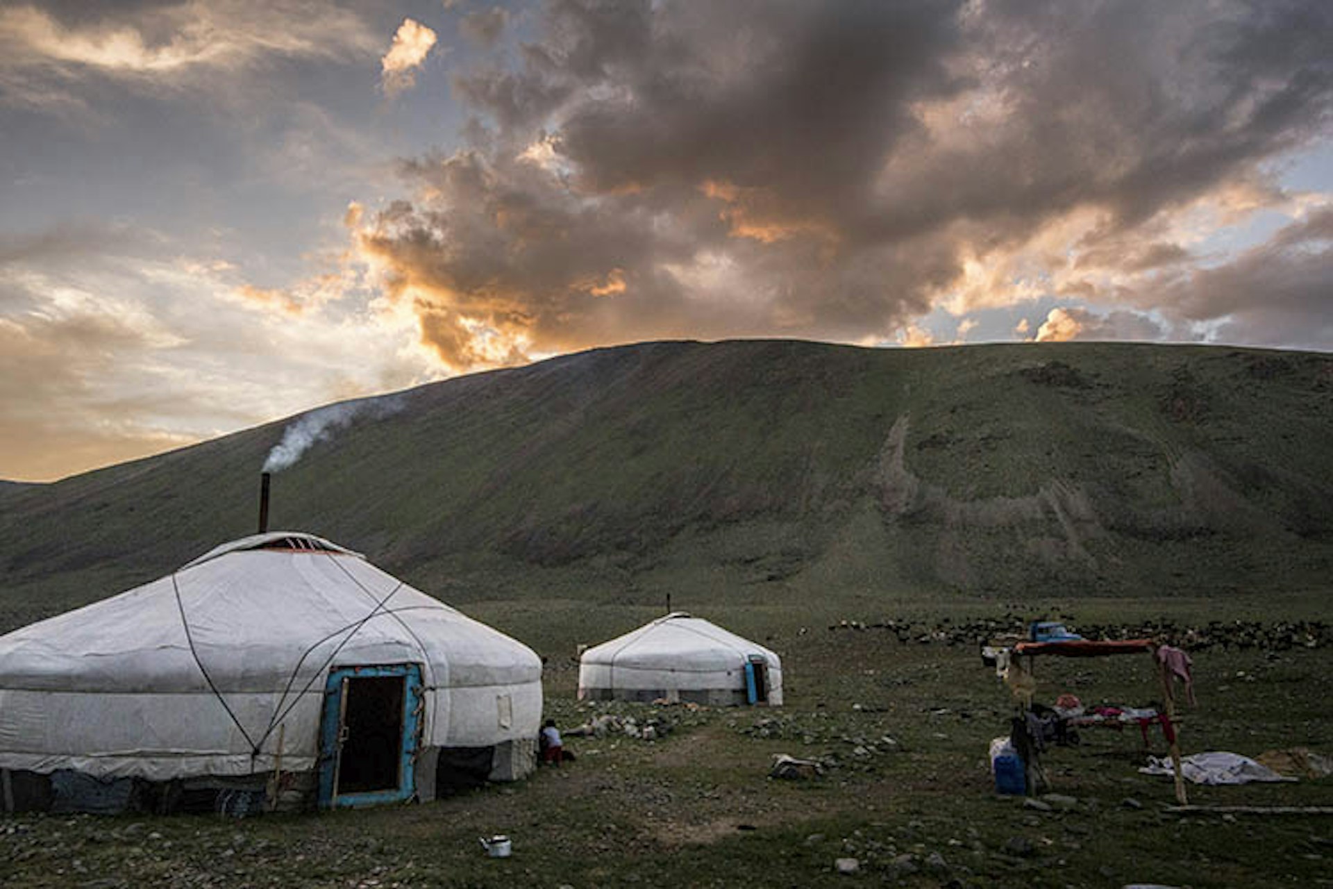 Eagle hunters' gers at dusk. Image by David Baxendale / Lonely Planet