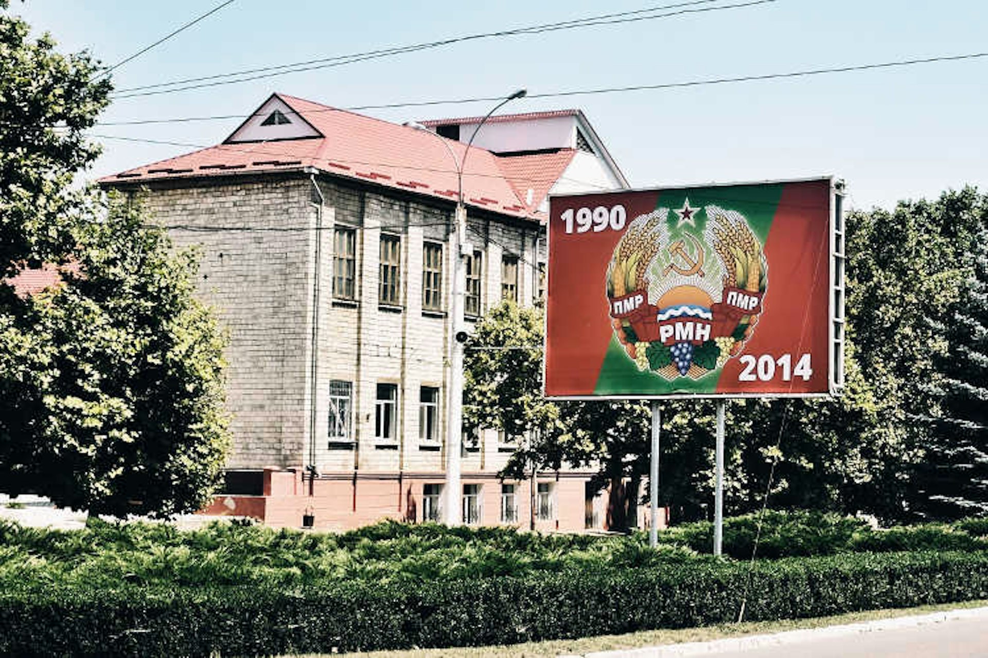 ‘Hammer and sickle’ billboard, Tiraspol. Image by Mark Baker / Lonely Planet