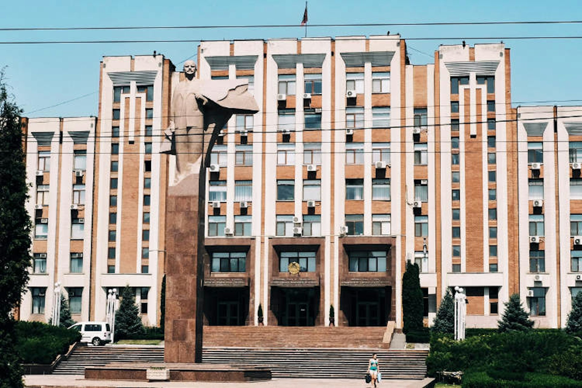 Presidential Palace fronted by Lenin's statue, Tiraspol. Image by Mark Baker / Lonely Planet