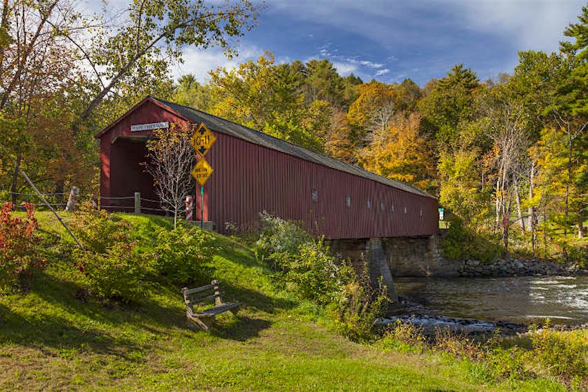 The picturesque covered bridge in West Cornwall, Connecticut. Image by Jeff Hunter / Photostock / Getty