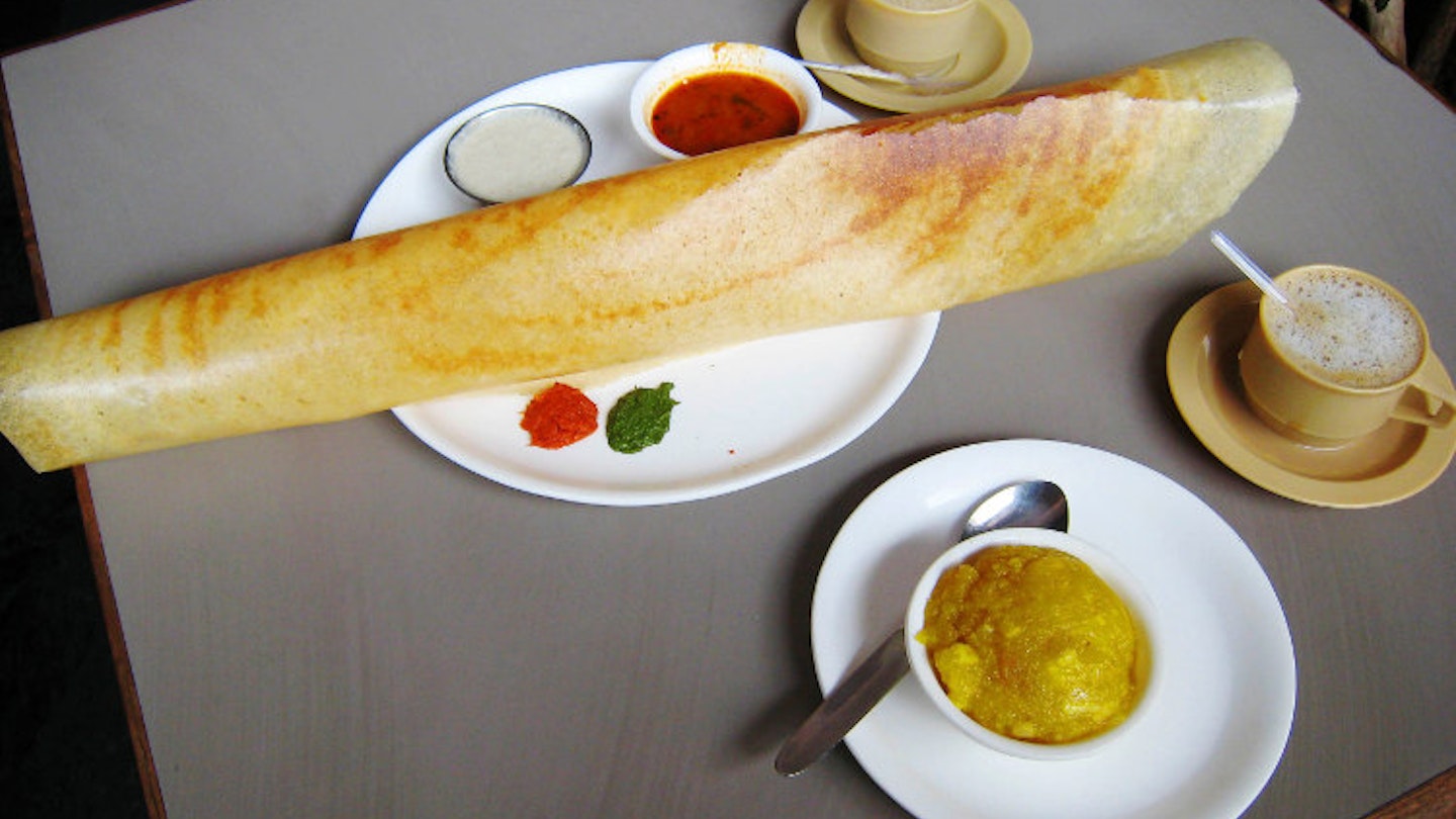 Supersized paper dosa and chai. Image by Charles Haynes / CC BY-SA 2.0.