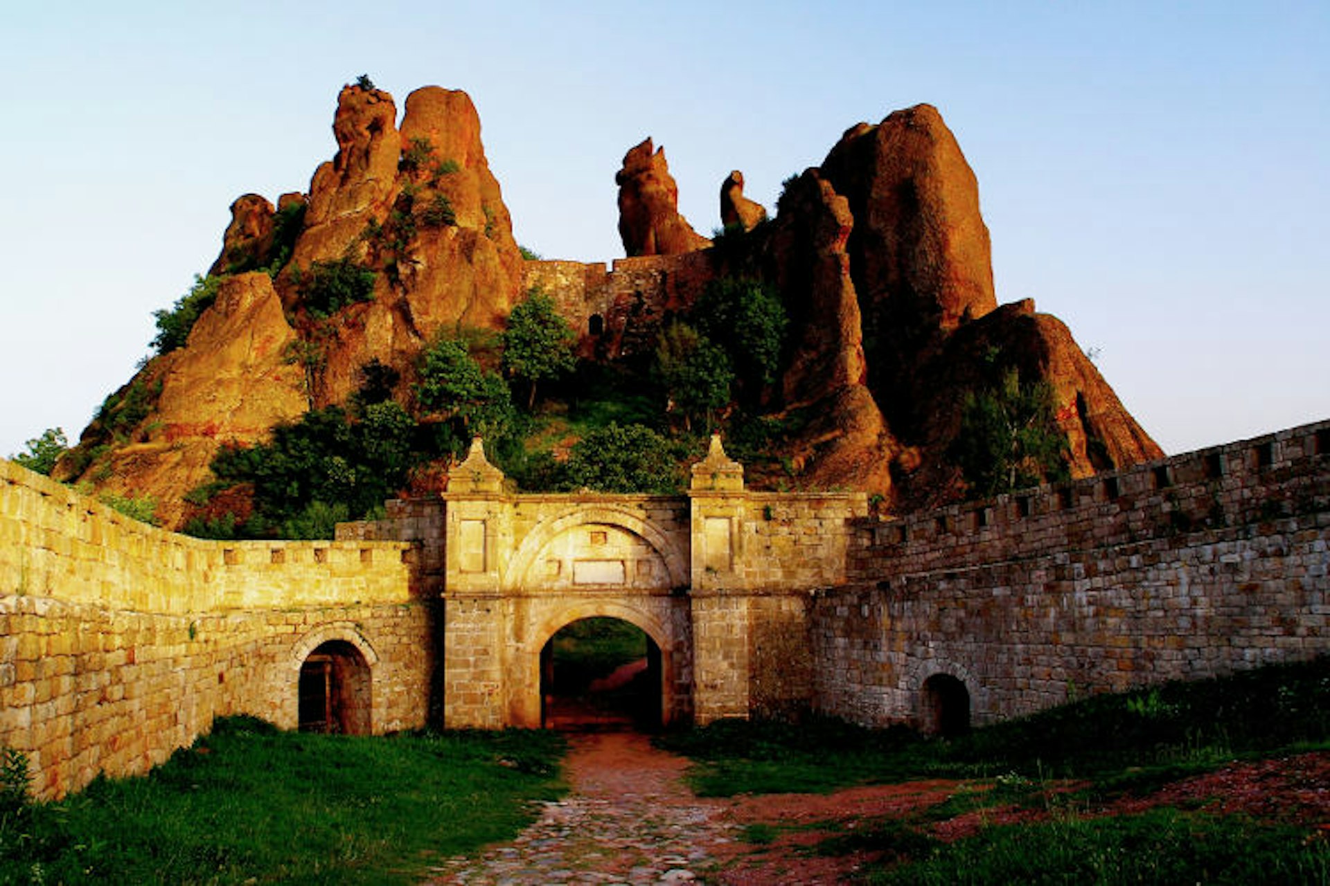 Belogradchik Fortress is guarded by an eerie rock tower. Image by Dimitar Sotirov / Getty Images