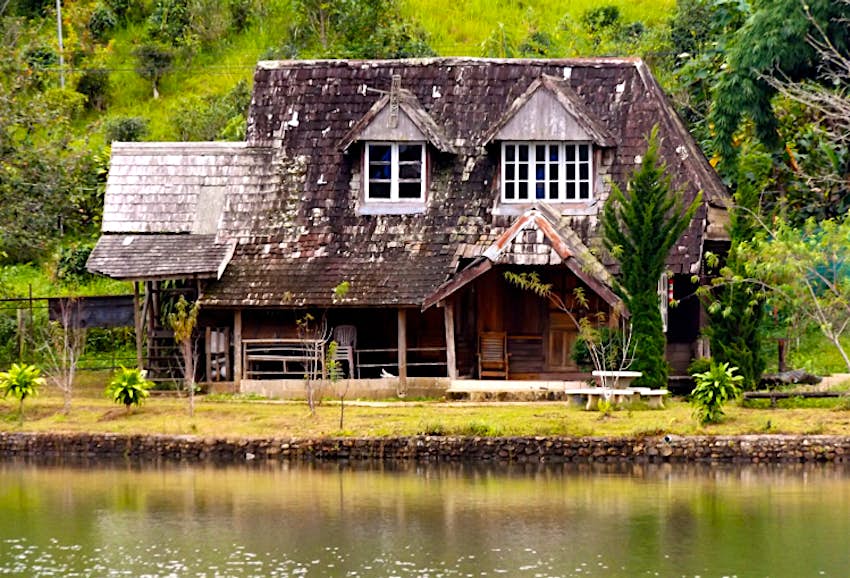 Features - Lake cottage, Mae Aw (Ban Rak Thai), Thailand. Image by Jack Southan / Lonely Planet Lake cottage, Mae Aw (Ban Rak Thai), Thailand. Image by Jack Southan / Lonely Planet