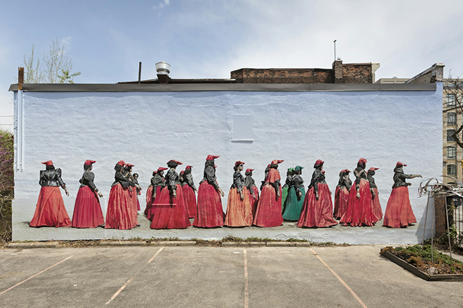 Mural at Museum of Contemporary Canadian Art. Courtyard mural installation with Jim Naughten, Herero Women Marching, 2012. Photo: Toni Hafkenscheid