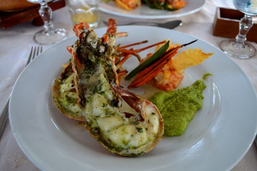 Fresh lobster is one of myriad seafood options in Mauritius. Image by Emma Sparks / Lonely Planet