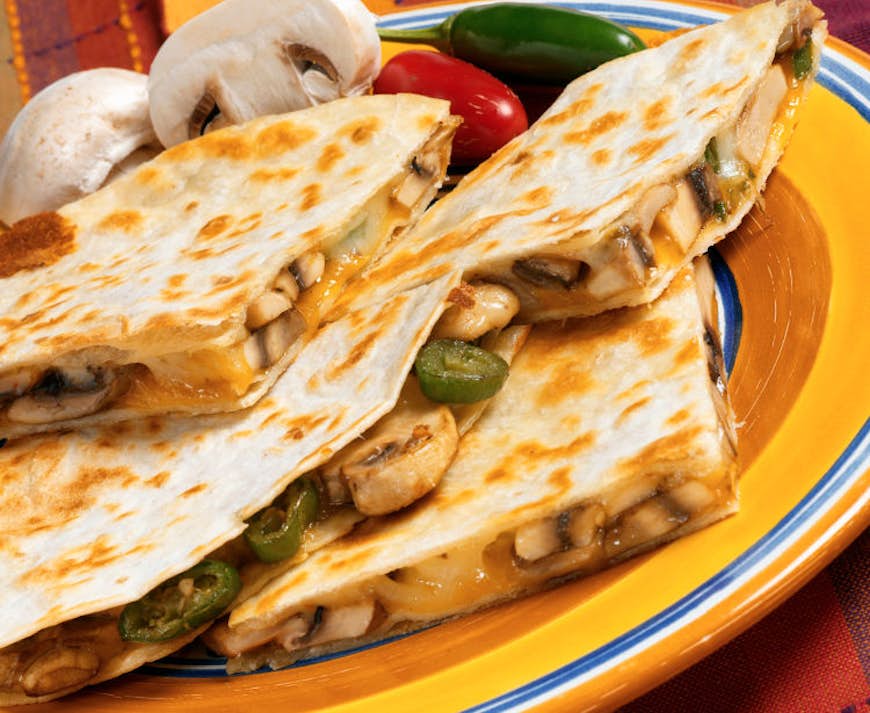 Quesadillas with jalapenos. Image by Paul Poplis / Stockfood Creative / Getty