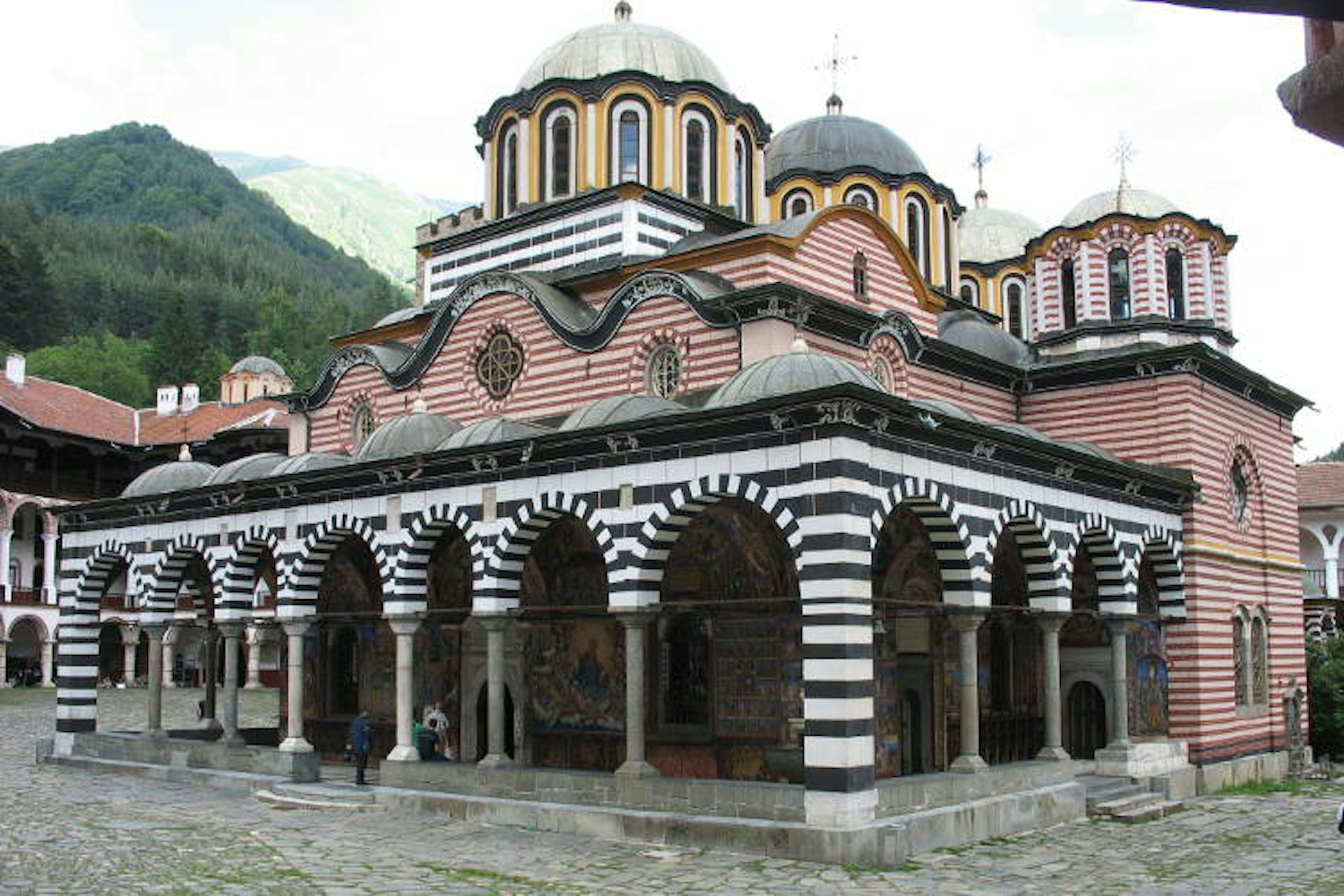 Forest-framed medieval Rila Monastery. Image by Esther Westerveld / CC BY 2.0